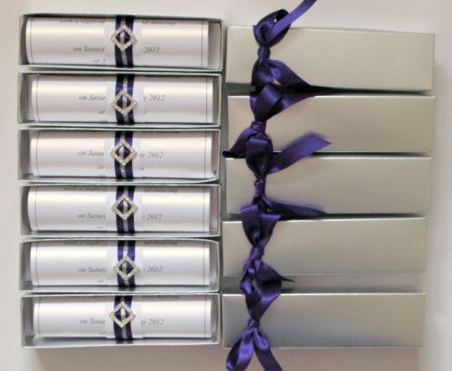 I made 70 engagement invitation scrolls in silver purple